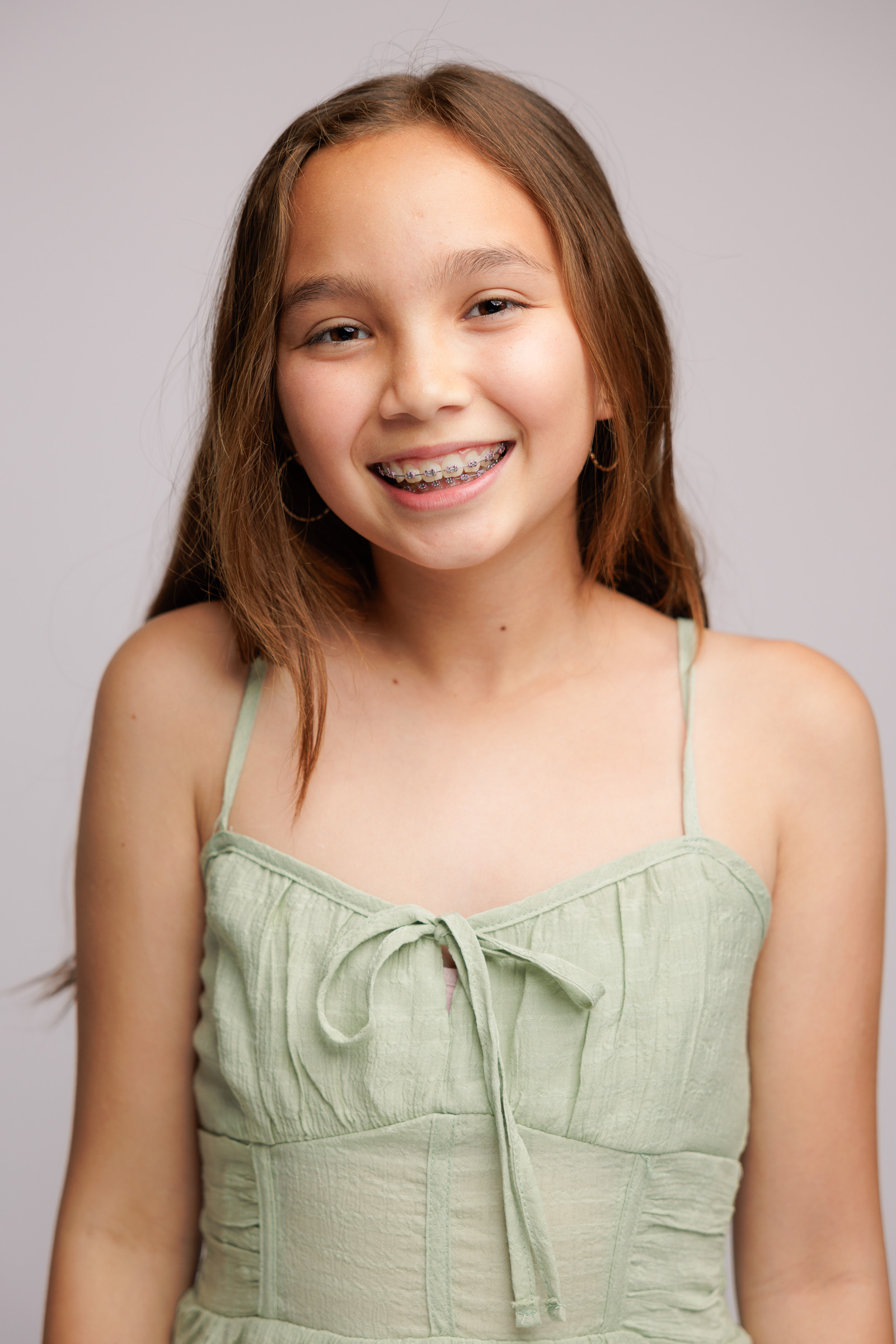 Smiling child actor photographed for a professional acting headshot