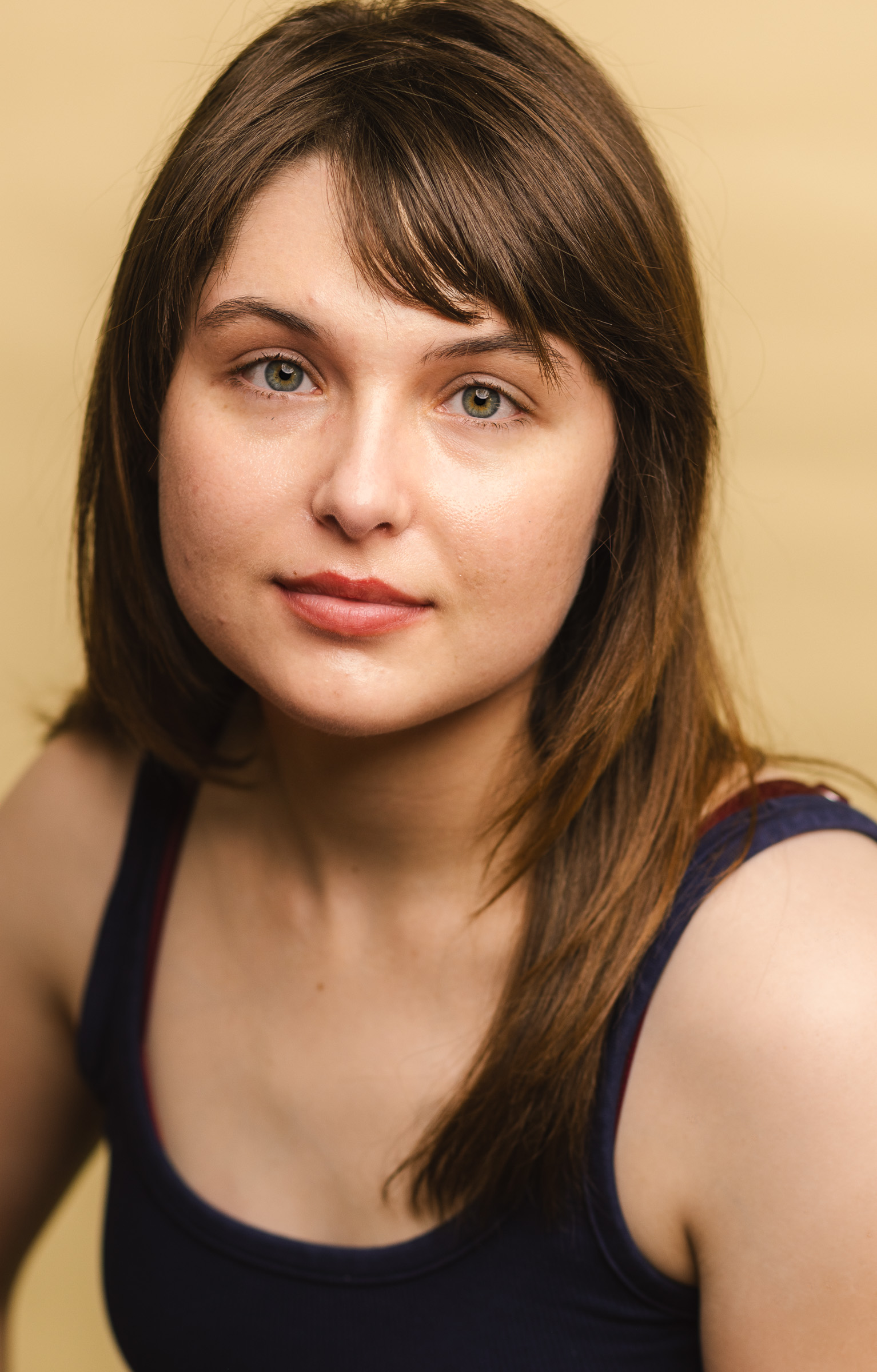 Natural theatrical actress headshot with a relaxed expression