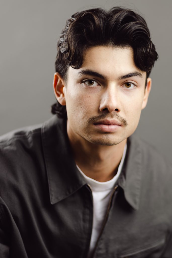 Actor wearing a simple wardrobe choice for professional headshots